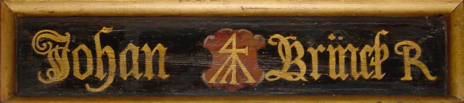 Johan Brincks navn for enden af et af pulpiturerne i Budolfi kirke